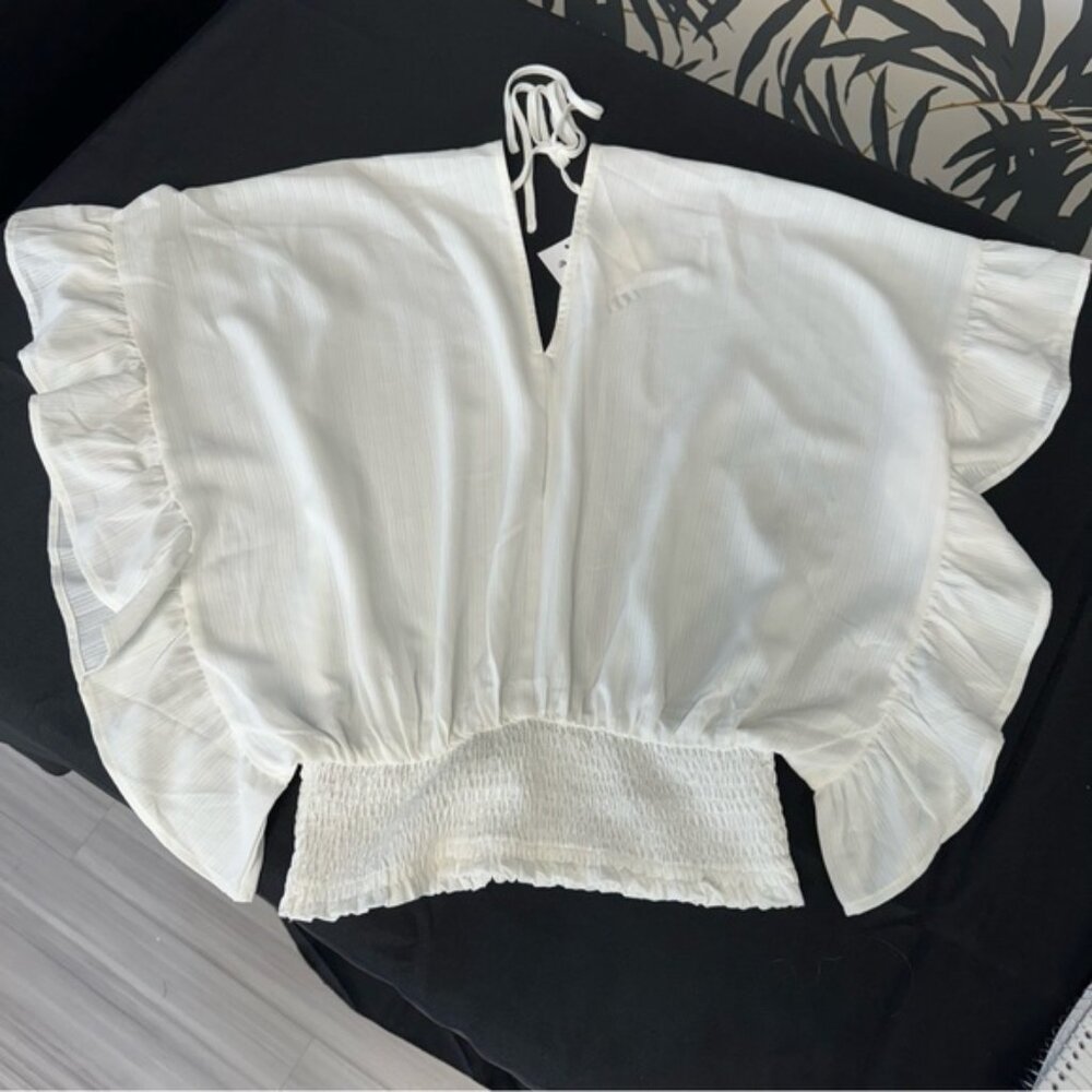 Elegant White Top w/ Ruffle Sleeve Detail and Tie at Back Neckline